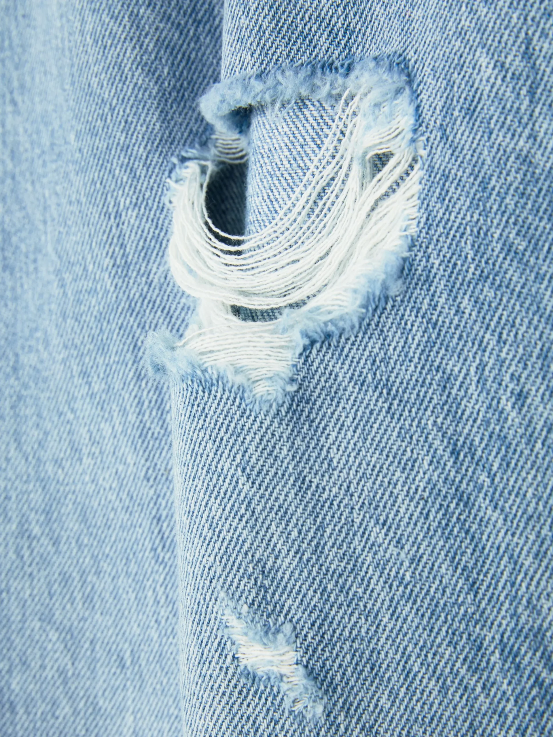 Rita Ora Ripped Dad Jeans